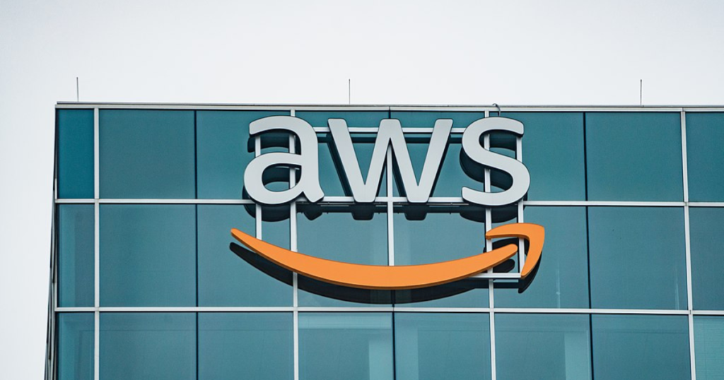 AWS logo on glass building.