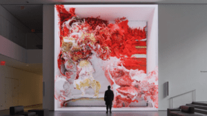 Abstract art installation with red and gold accents.