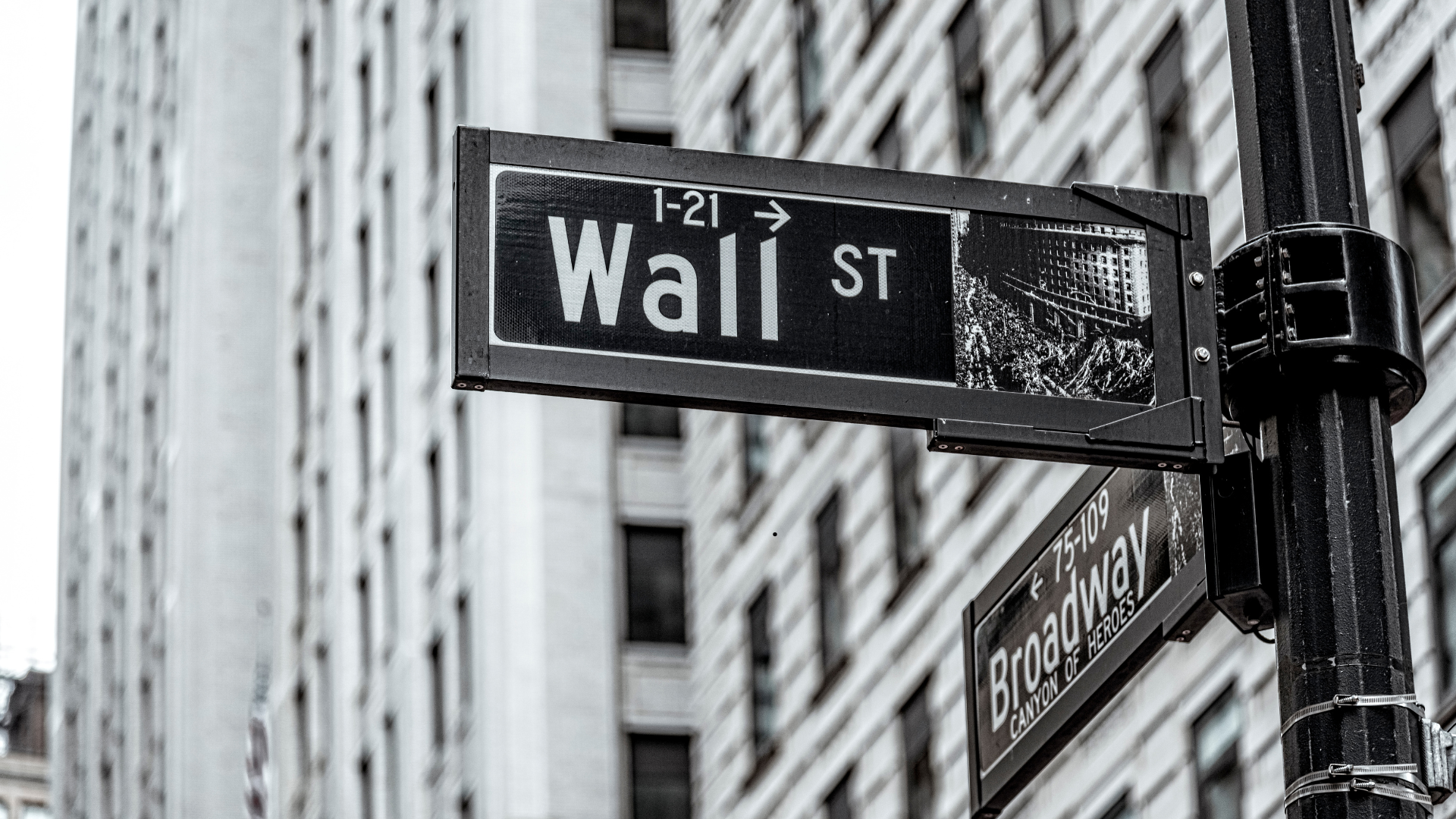 photo of wall street street sign