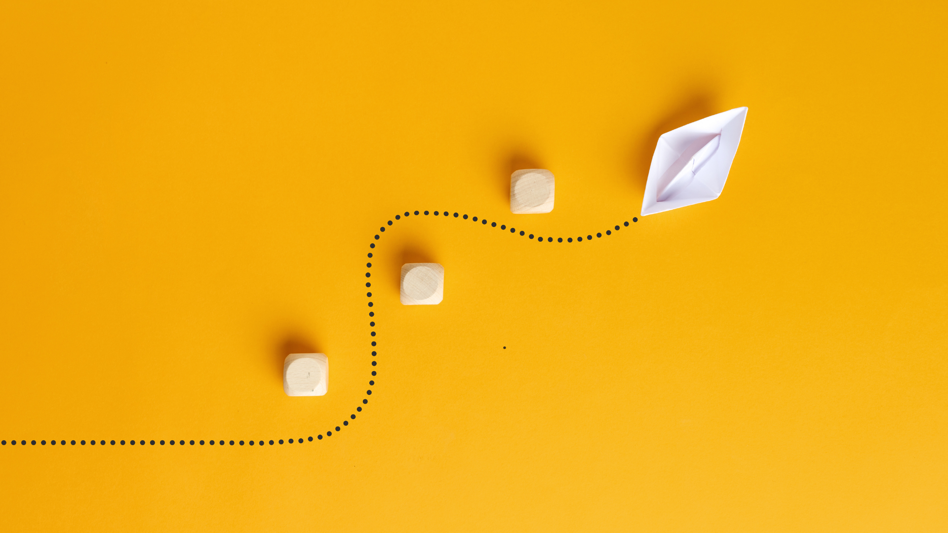 illustration of a paper boat going around obstacles